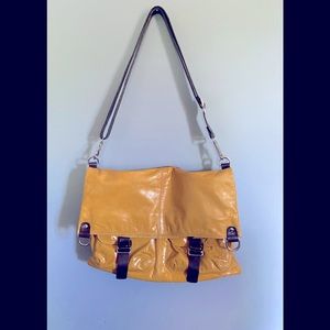 Nino Bossi yellow handbag